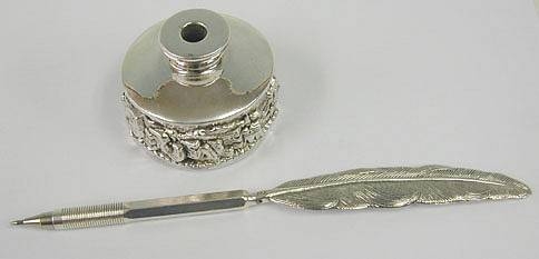 Sterling silver quill pen and inkwell set with jerusalem relief view.